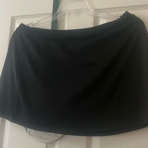 Tennis, pickleball, golf athletic skort with built in shorts. Smoke free home.